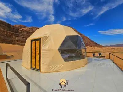 a tent in the middle of the desert at Desert Knights camp in Wadi Rum