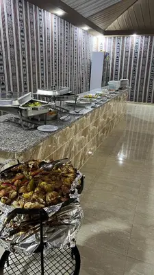 a buffet line with many different types of food at Desert Knights camp in Wadi Rum