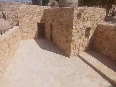 two entrances to a building in a stone wall at Tafileh-Sila'a Heritage Village in At-Tafilah