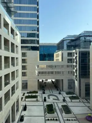 a view of a building in a city with tall buildings at Modern studio in the heart of Amman in Amman