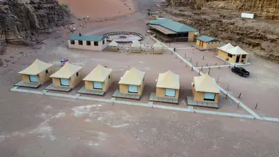 an overhead view of a building with yellow roofs at Lulua luxury camp in Wadi Rum