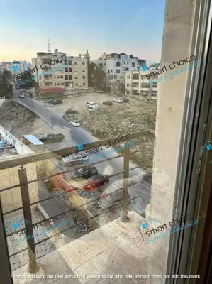 a view of a construction site from a window at fancy apartment gardens st 410 in Umm Uthainah