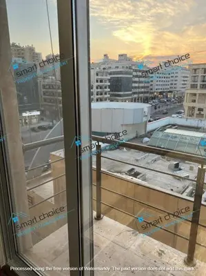 a view of a city from a window at fancy apartment gardens st 410 in Umm Uthainah