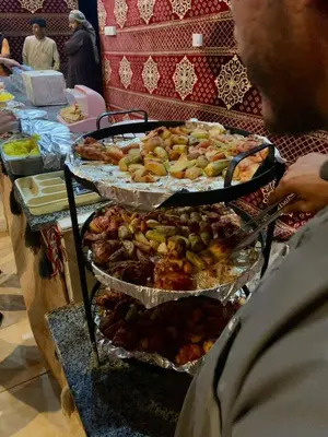 a group of trays of food on a table at Salameh's Bedouin Camp in Wadi Rum