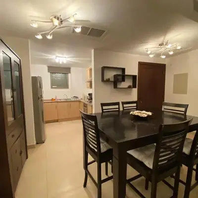 Lovely first floor tow bed rooms overviewing circular pool for families only in Talabay Aqaba