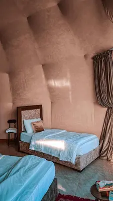 a bedroom with two beds in a room at Jori Luxury Camp in Wadi Rum
