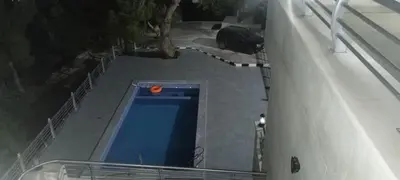 an overhead view of a swimming pool on a boat at The Pine Tree Chalet in Jerash