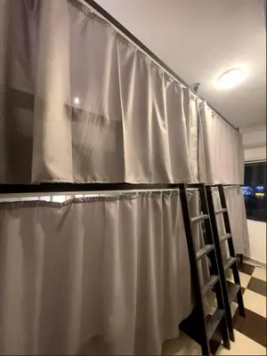 a curtain that is hanging in a room at Friends Oasis in Aqaba