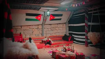 a room with a red couch and a street light at My Grandfathers House Dana Heritage and Eco Lodge in Dana