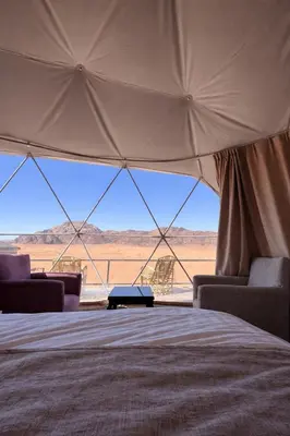 a tent with a view of the desert at Sidra Luxury Camp in Rum in Wadi Rum