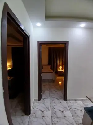 a room with a view of a room with a bedroom at dream house hotel in Jerash