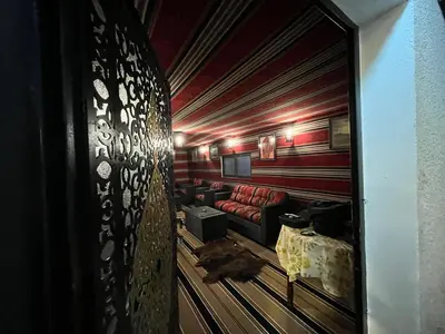 a view of a living room with a couch at Mansi Residence in Wadi Musa