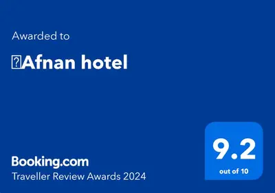 a blue screen with the text upgraded to afghan hotel at ِAfnan hotel in Aqaba
