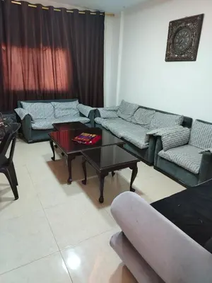 a living room with couches and a coffee table at شقة فاخرة مع مطل luxerious with nice view in Amman