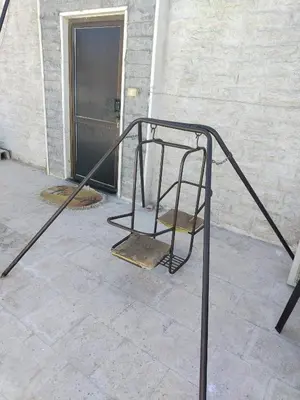 a metal staircase in front of a building with a door at شقة فاخرة مع مطل luxerious with nice view in Amman