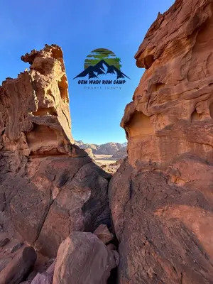a view of the desert from a rock cliff at Gem wadi rum camp in Wadi Rum