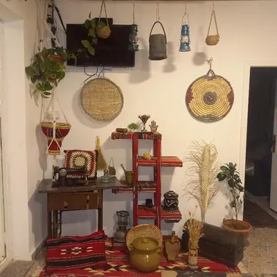 a room with lots of items on the wall at Little Green Farm in Wadi Musa