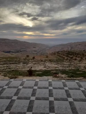 a checkered chess board on top of a mountain at مزرعة الشفق in Ad Dimnah
