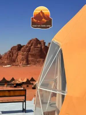 a tent in the desert with a view of a mountain at Wadi Rum Santa Camp in Wadi Rum