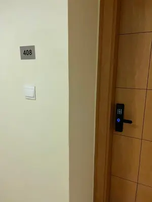 a door with a sign that says on it at DAMAC Luxury new 1 bedroom apartment in Amman