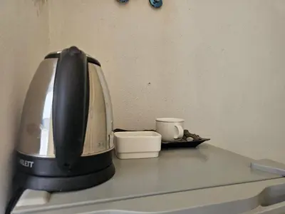 a coffee maker sitting on top of a counter at MAXIMAS LUXURY Wadi Rum in Wadi Rum