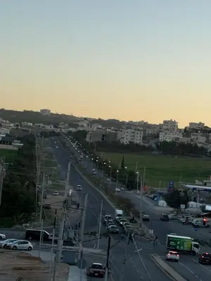 a busy highway with cars on the road at Karak Plaza Residences in Kerak