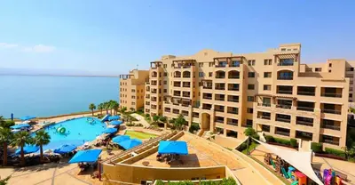 an aerial view of a resort with a swimming pool at E21 Samarah Resort Apartments in Sowayma