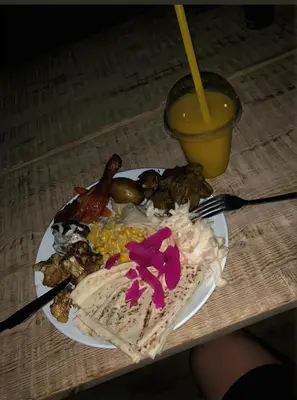 a plate of food on a table with a plate of food at Rum luxury star in Wadi Rum