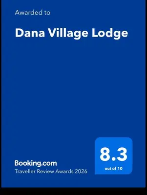 a screenshot of a cell phone with a dana village lodge at Dana Village Lodge in Dana