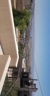 an overhead view of a city street with buildings at Golden hotel in Jerash