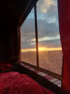 a view of the desert from a bus window at Moon shine camp in Wadi Rum