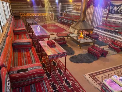 an overhead view of a room with tables and rugs at Wadi rum stay & tours in Wadi Rum
