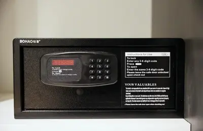 a microwave oven with a digital screen on top of it at Saraya Abdeen Hotel in Aqaba