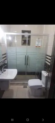 a bathroom with a toilet and a sink at Maan 12 in Ma‘ān