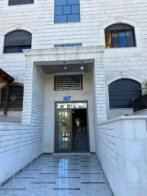 a building with a door with the number on it at 3 bed rooms apartment - 3 غرف نوم مفروشة دوار المشاغل عمان in Amman