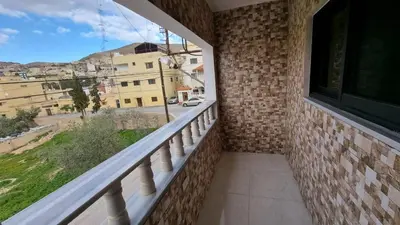 a balcony with a view of a city at City centre Apartment in Petra