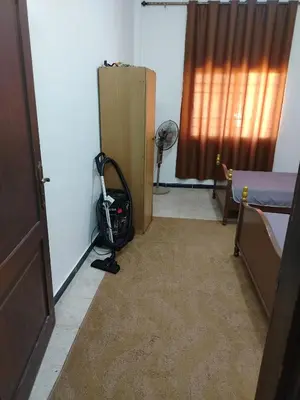 a room with a room with a door and a room with a bed at شقة ام نوارة الحديثة الفارهة spacious economic flat in Amman