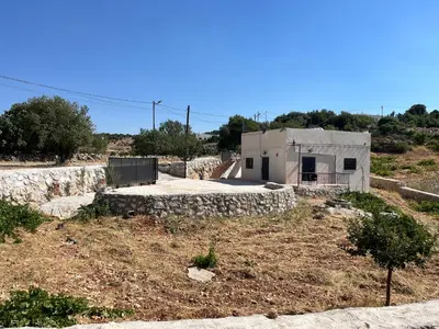 a small house in the middle of a field at منزل مستقل لقضاء اجمل الاوقات بجبال عجلون in Ajloun