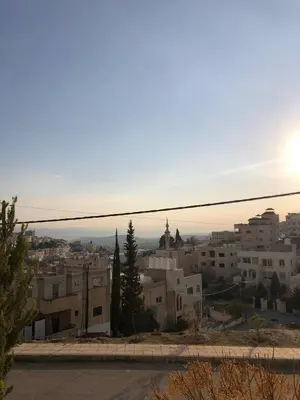 a view of a city with buildings at Jarash in Jerash