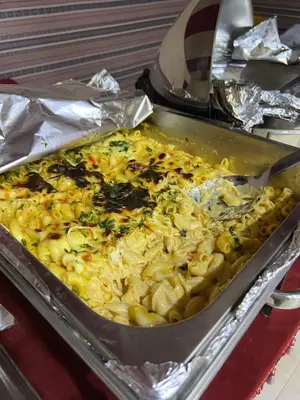 a casserole dish filled with pasta and vegetables at Magic mountains rum in Wadi Rum