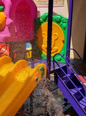 a close up of a toy machine with a yellow object at Jumeirah Chalet جميرا شاليه in Amman