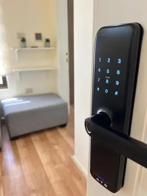 a close up of a door handle with a room at Cozy & Comfortable Studio in the heart of Amman, Studio #17 in Umm Uthainah
