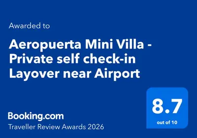 a blue sign that readsorney minivan private self check in lawyer near airport at Aeropuerta Mini Villa - Private self check-in Layover near Airport in Al Qasţal