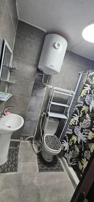 a bathroom with a toilet and a sink at ستوديو مستقل داخل فيلا in Amman