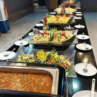 a buffet line with many different types of food at Mountain star in Disah
