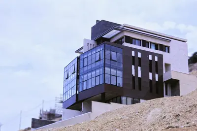 a building sitting on top of a hill at Villa rose 3 in Khirbat Abū Ḩāmid