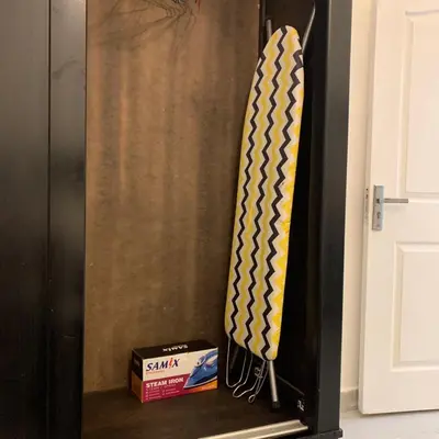 a door with two ties and a box at Rosario Farm Home in Amman