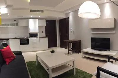 a living room with a couch and a table at Apartment in Amman with wow furniture in Amman