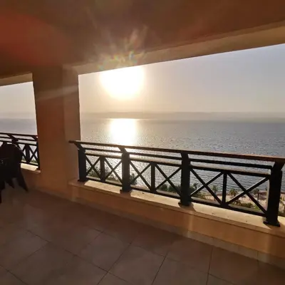 a view of the ocean from a balcony at E23 Luxury - Full Sea view-Samra Resort in Sowayma