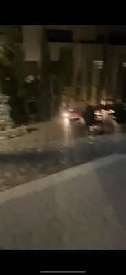 a blurry picture of a person on the street at Omar big house on abdun in Amman